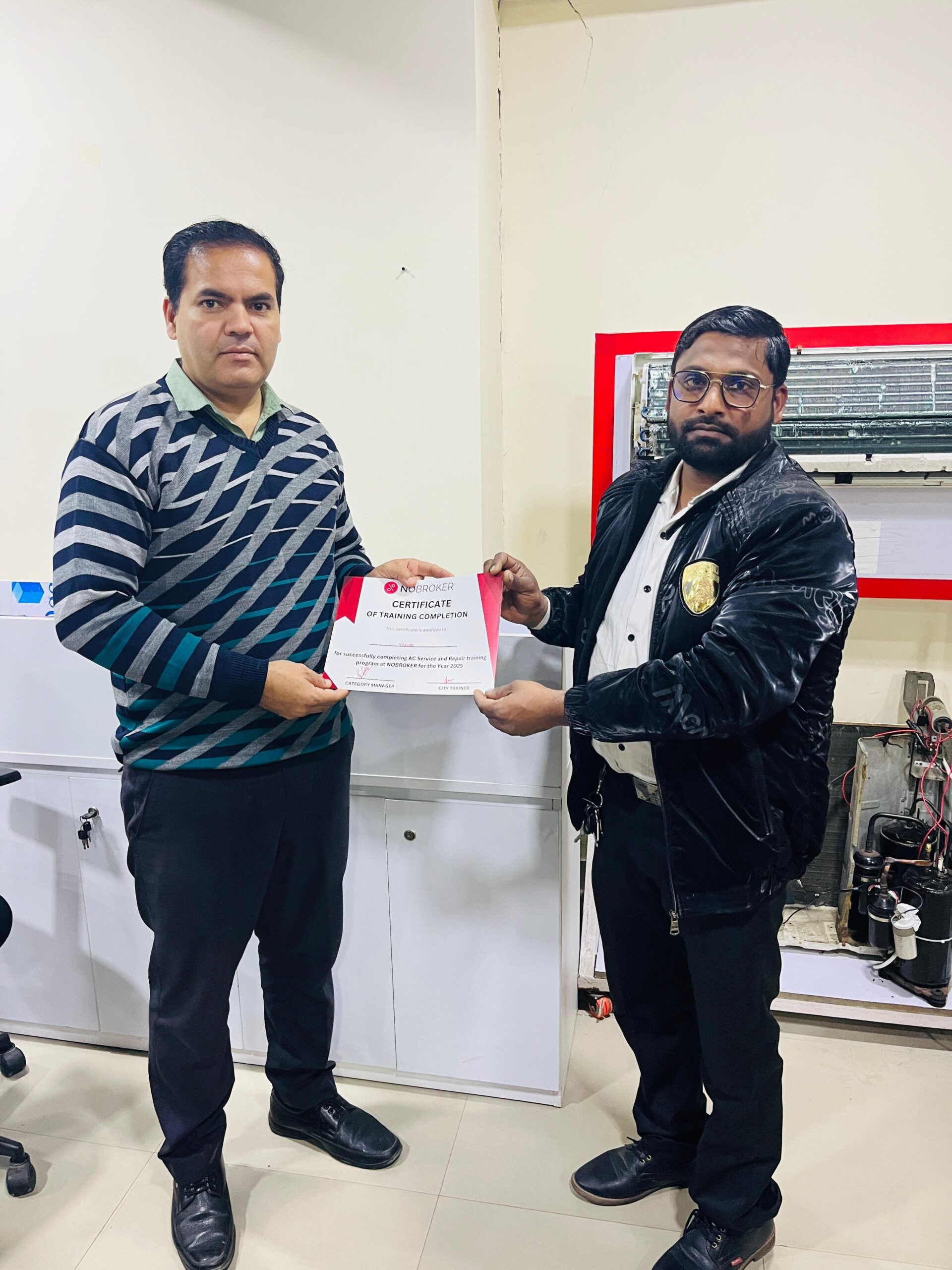 Certified technician holding service certificate at customer home