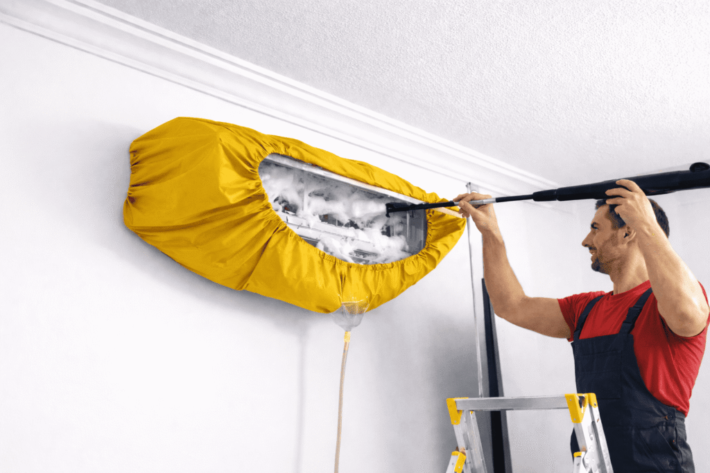 Foam wash cleaning of air conditioner by professional technician